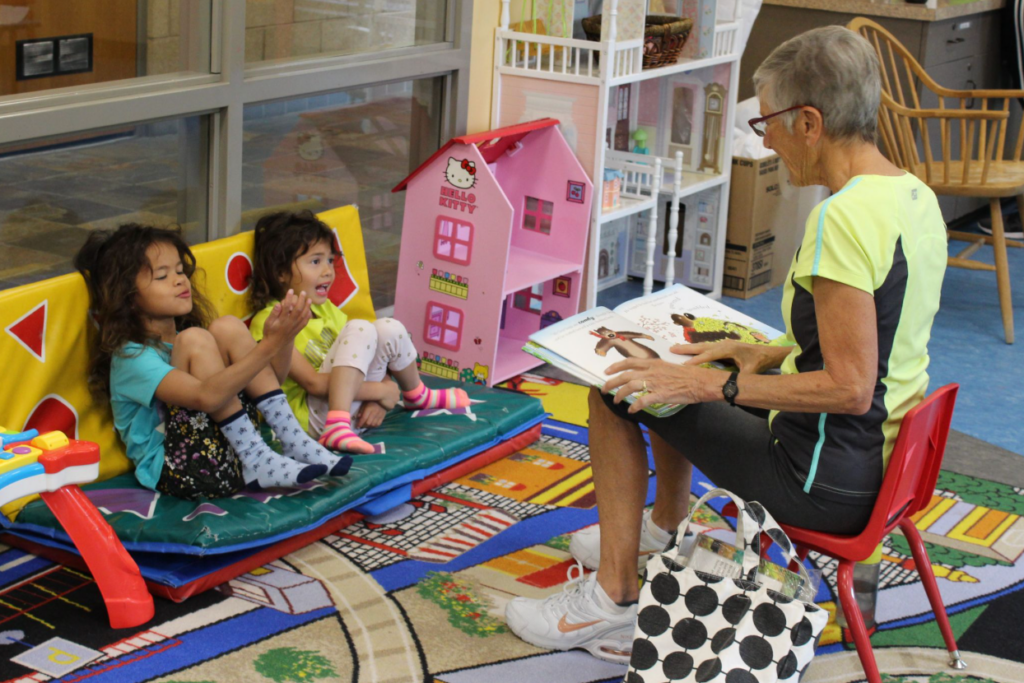 woma reading to children