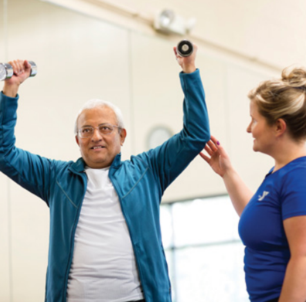 man lifting weights